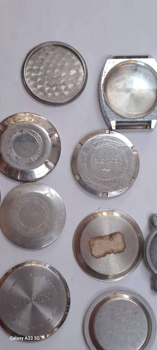 Assorted vintage men's watch case backs seiko, oris, lanco citizen etc