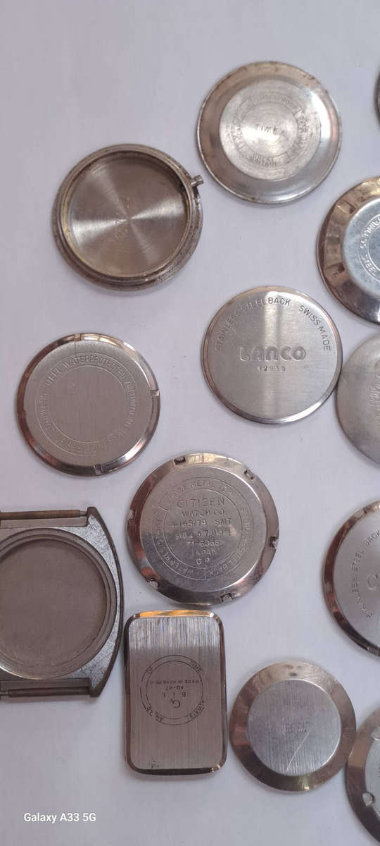 Assorted vintage men's watch case backs seiko, oris, lanco citizen etc