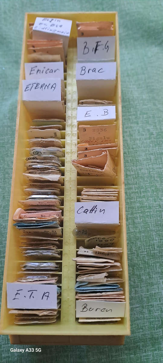 box of 100`s, sorted and originally packed new vintage watch winding stems
