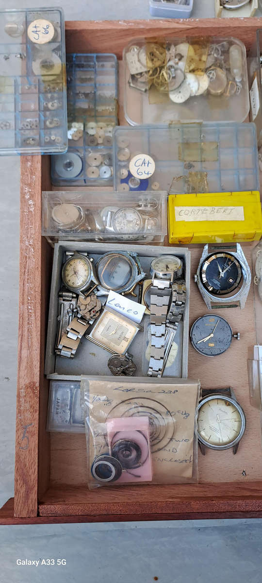 Draw full of various vintage watch movements and parts as per pictures