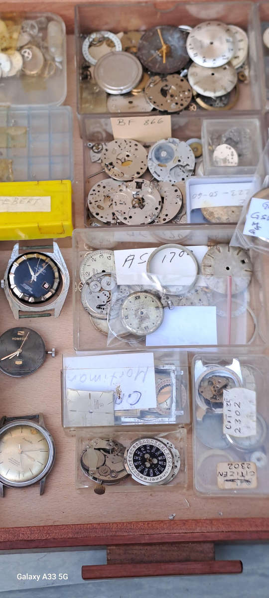 Draw full of various vintage watch movements and parts as per pictures