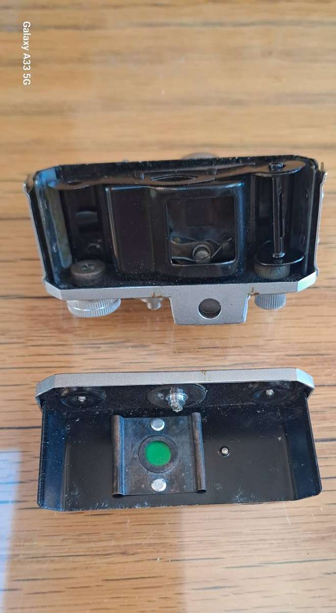 A Morita Kiku 16 Model II subminiature camera, within a leather case