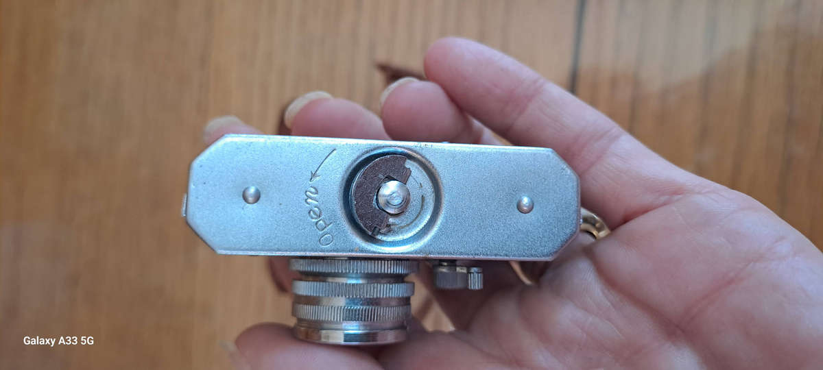 A Morita Kiku 16 Model II subminiature camera, within a leather case