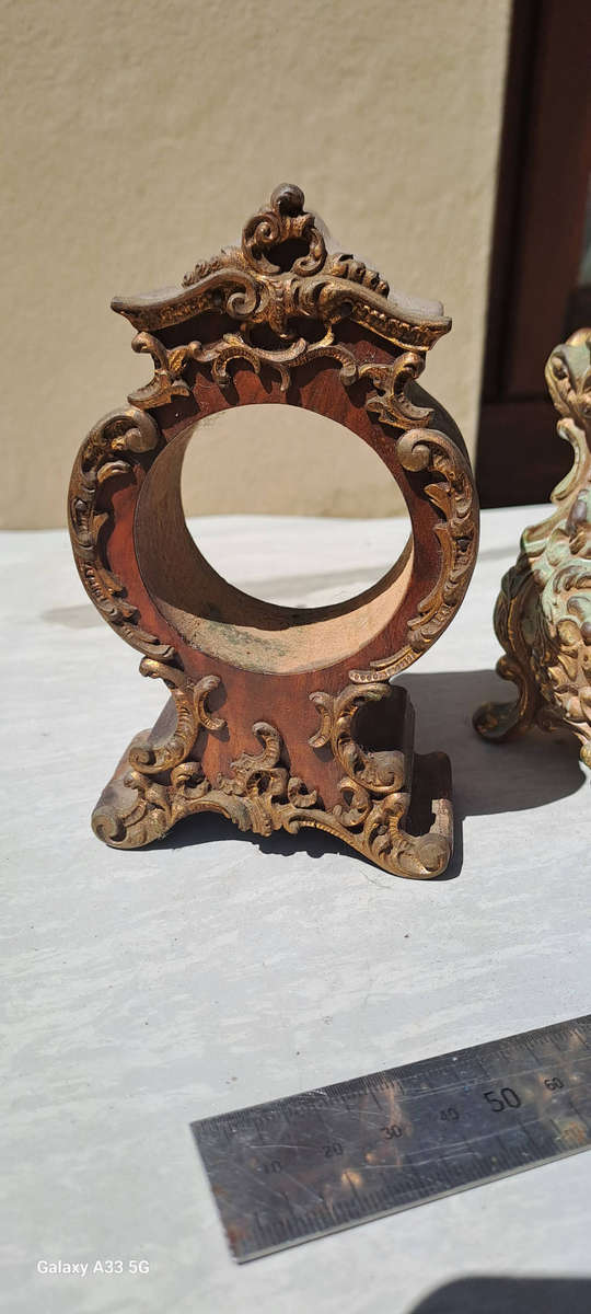 2 small clock housings 1 wood 1x brass and 1x small clock