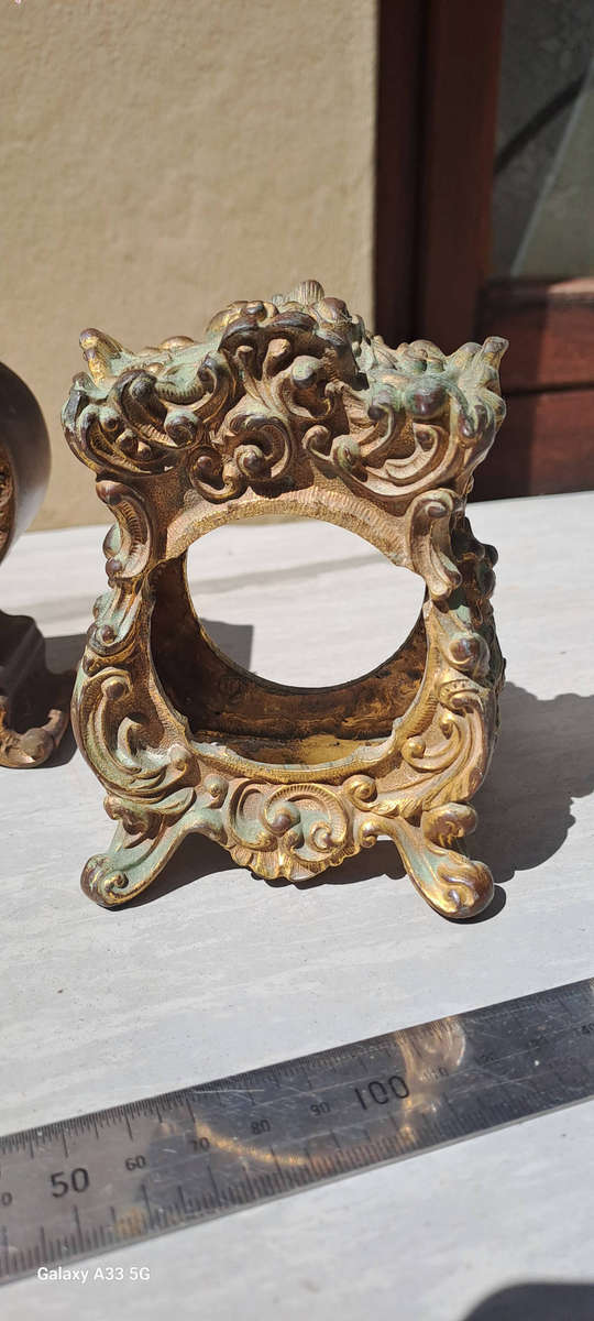 2 small clock housings 1 wood 1x brass and 1x small clock