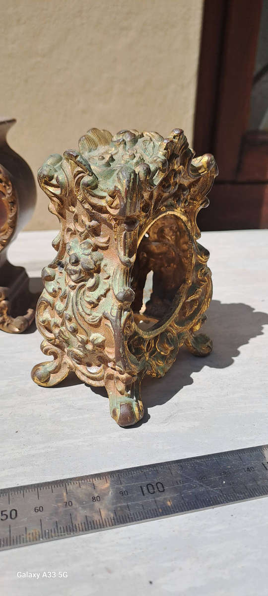 2 small clock housings 1 wood 1x brass and 1x small clock