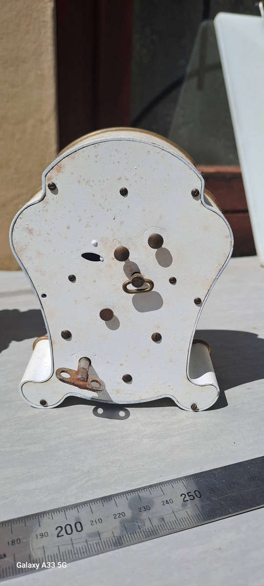 2 small clock housings 1 wood 1x brass and 1x small clock