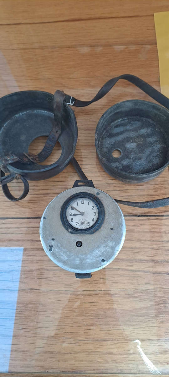 Night watchmans clock in leather case