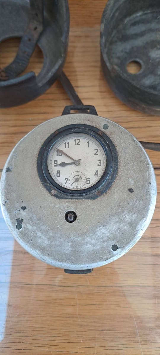 Night watchmans clock in leather case