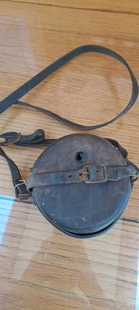 Night watchmans clock in leather case