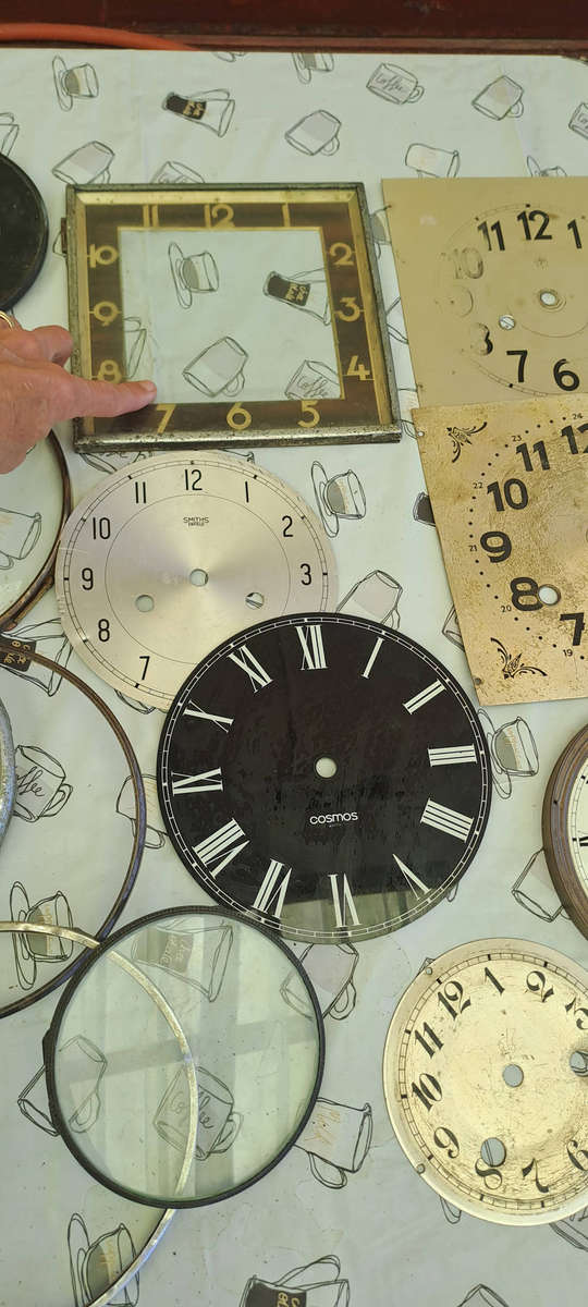 Lot of vintage clock faces, bezels, glass etc