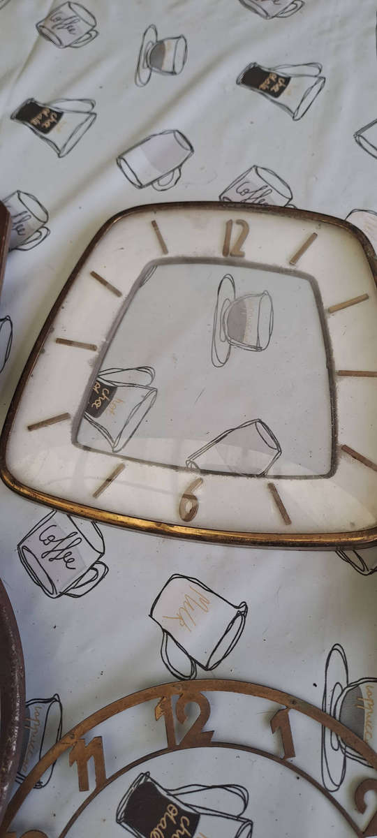 Lot of vintage clock faces, bezels, glass etc
