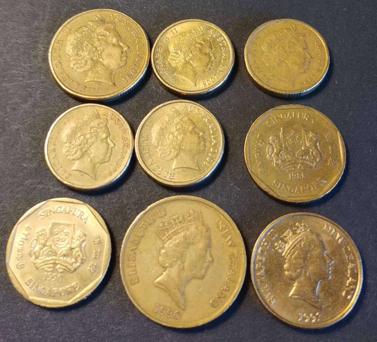 14 X Mixed dollars from 3 countries. See description for more details.