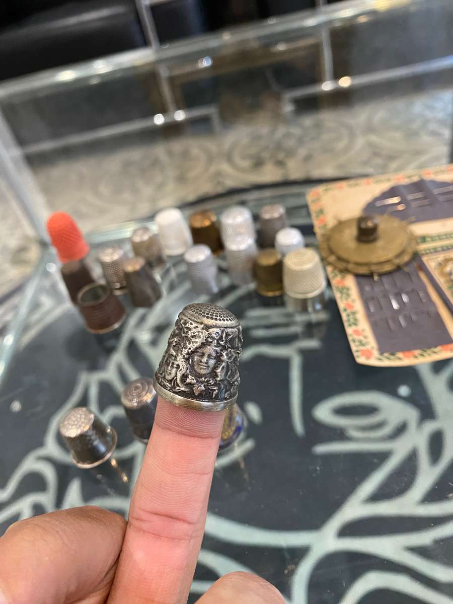 Sterling silver, enamel, painted and metal thimbles collection. Bid now!