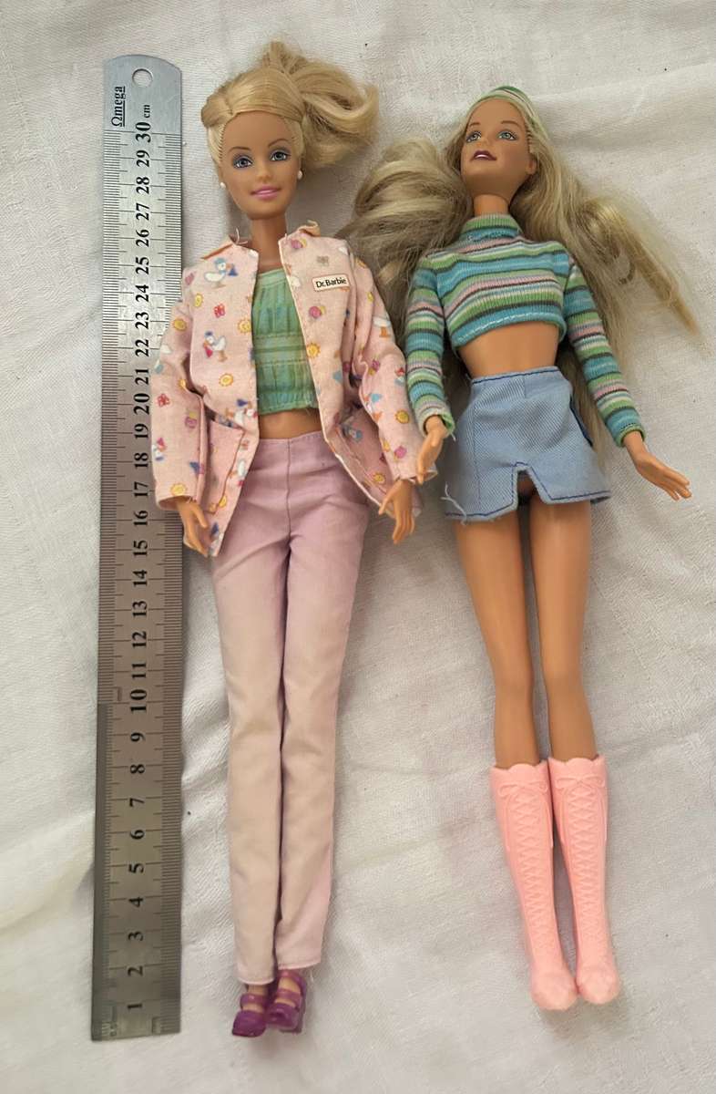 Two Vintage Barbie Dolls