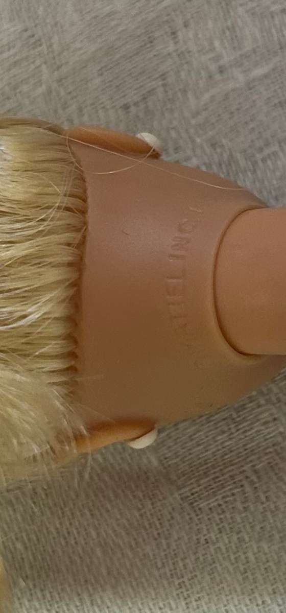 Two Vintage Barbie Dolls