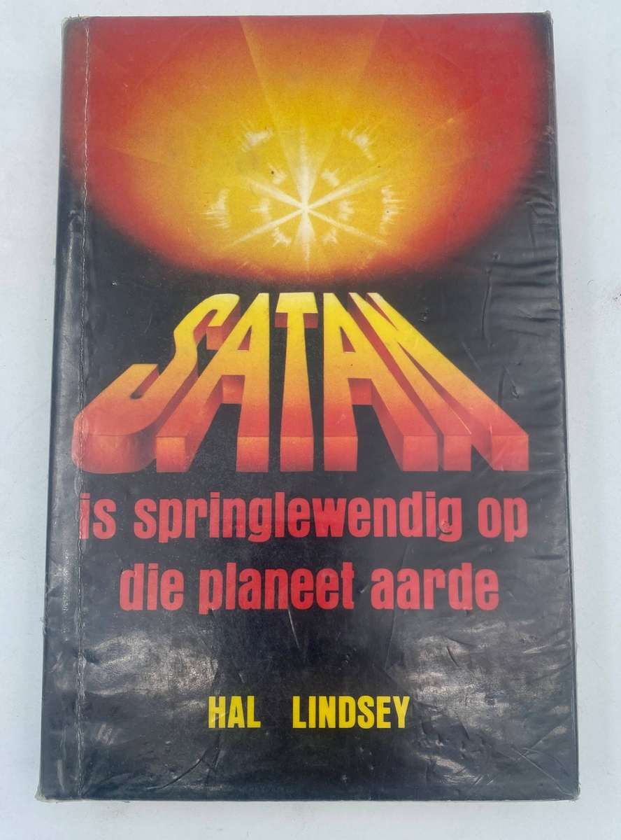 Satan is springlewendig op die planeet aarde - Hal Lindsey