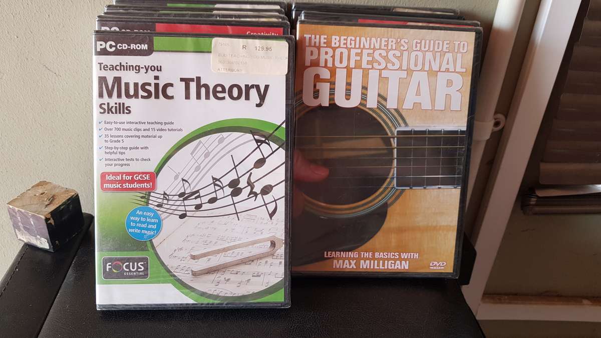 9 x CD's (Garden Designer, Home Designer, Music Theory, Guitar, Graphic Design, Desktop Publishing)