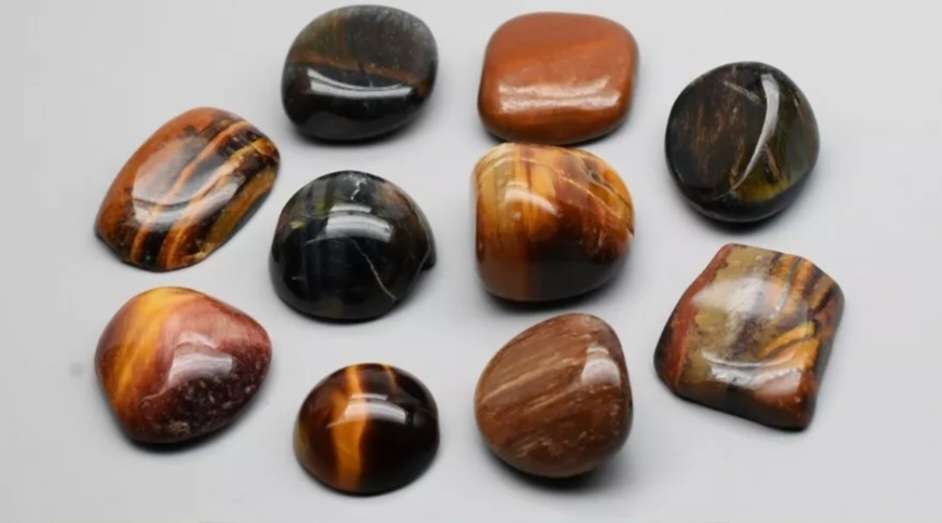 10 Piece Lot 100.91ct Natural Tiger's Eye
