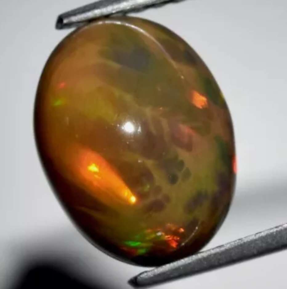 2.34ct Oval Natural Play-Of-Colour Crystal Black Opal