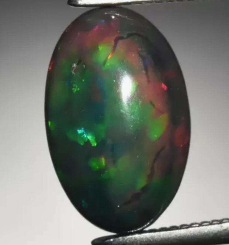1.48ct Oval Natural Play-Of-Colour Crystal Black Opal