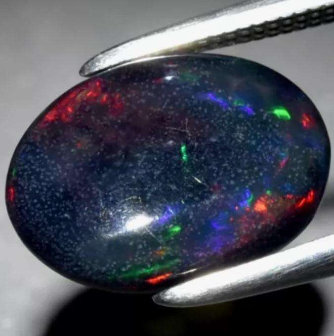 1.11ct Oval Natural Play-Of-Colour Crystal Black Opal
