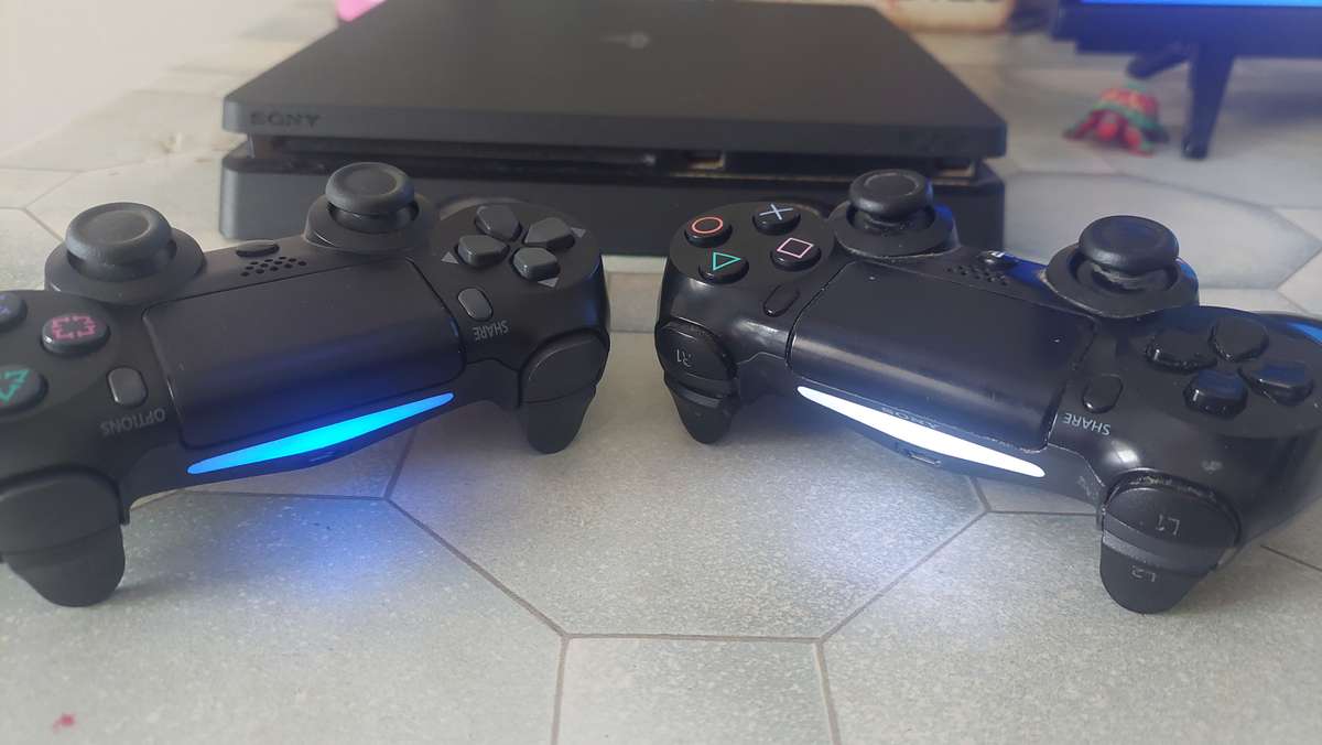 PS4 console and 2 controls