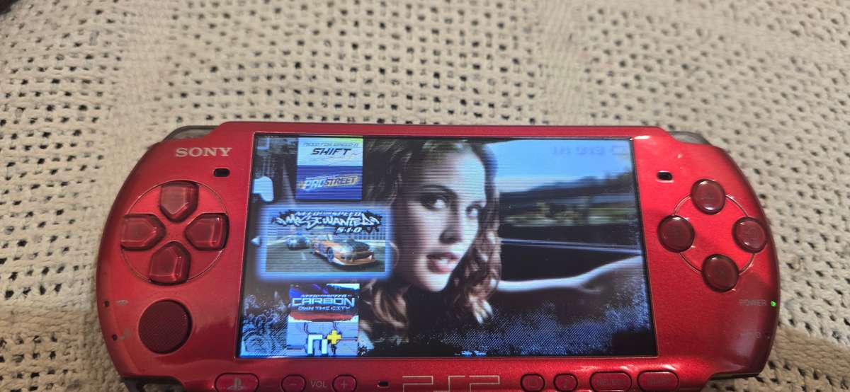 Red Psps 3000 modded 64gb loaded with 65+ games