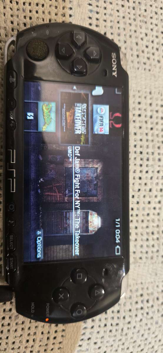 listing 1 PSP 3000 modded 64gb 60+games loaded