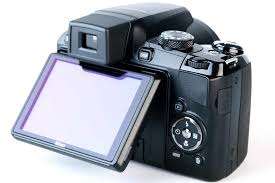 Nikon Coolpix P90 Camera with Tilt LCD Screen, Charger, 2 Batteries, in Bag