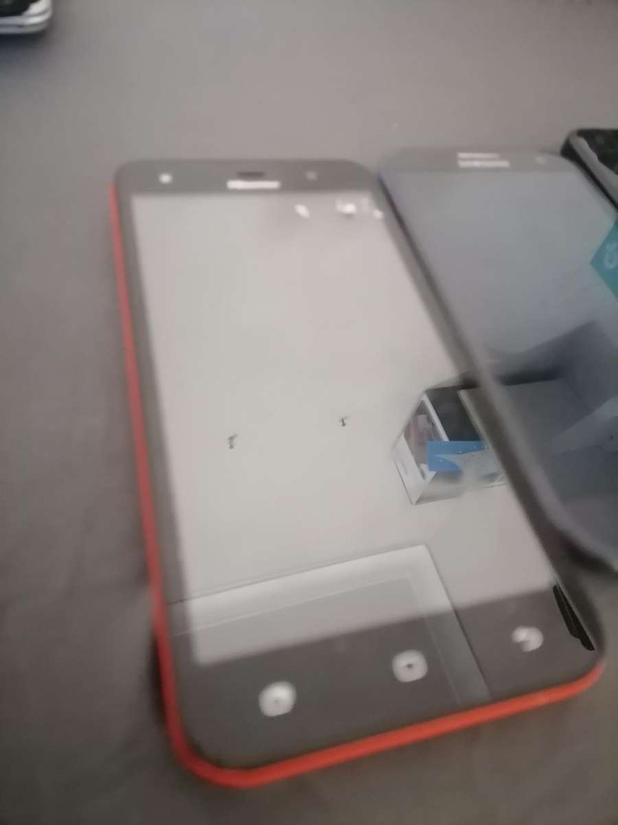 Lot of 3 x cell phones - Huawei, Samsung, Microsoft - Sold as is - One bid for the lot