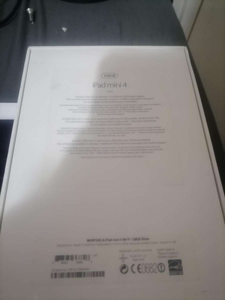 APPLE IPAD MINI 4 IN BOX*SHOWS CHARGER CONNECTED BUT NOT CHARGING, SOLD AS IS*