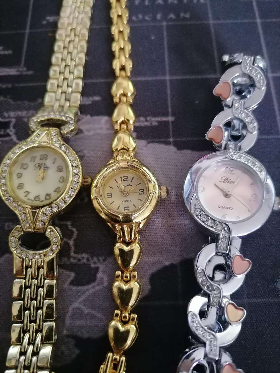 LOT OF 3 WATCHES*ONE IS 18CT GOLD PLATED*ONE BID FOR THE LOT**