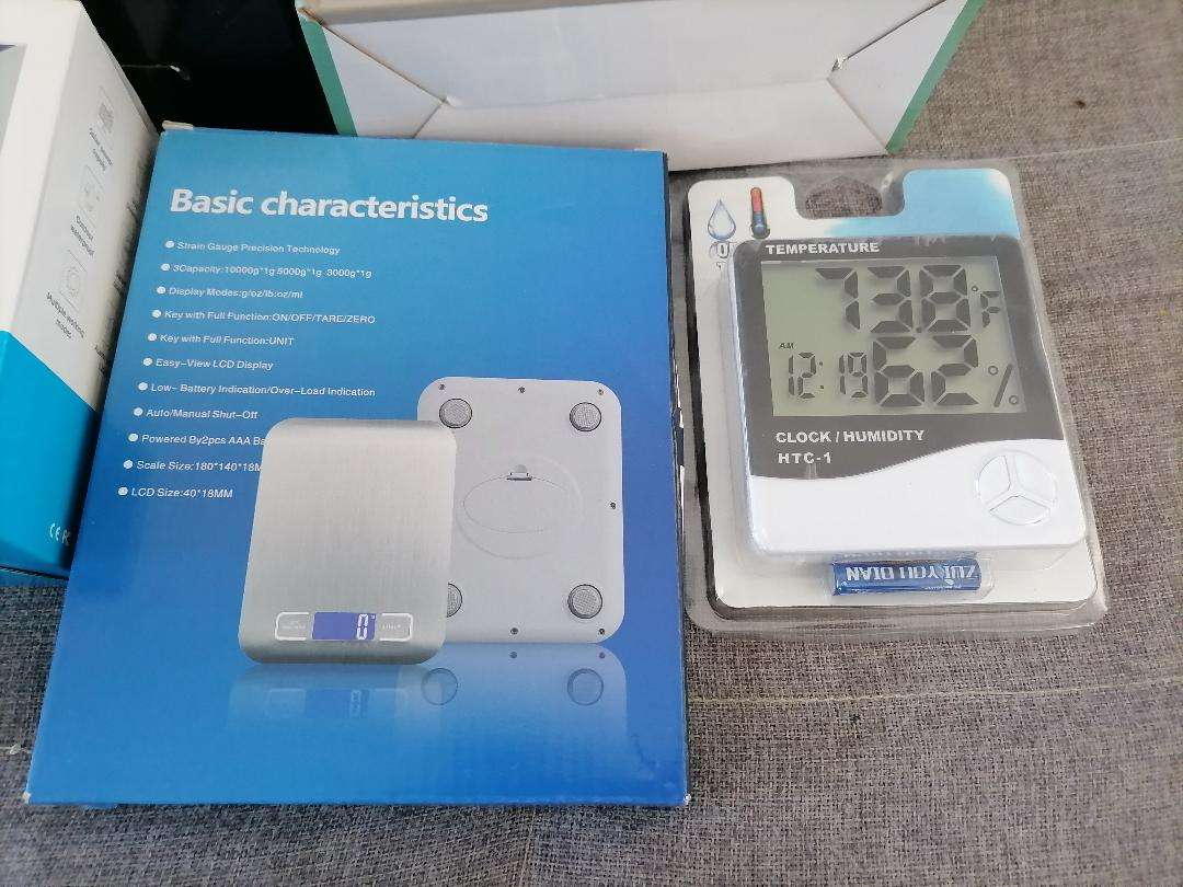 **LOT OF NEW ELECTRONICS*SOLAR MOTION ALARMS,CAMING LAMP,USB FAN,DIGITAL SCALE,TEMP/CLOCK*