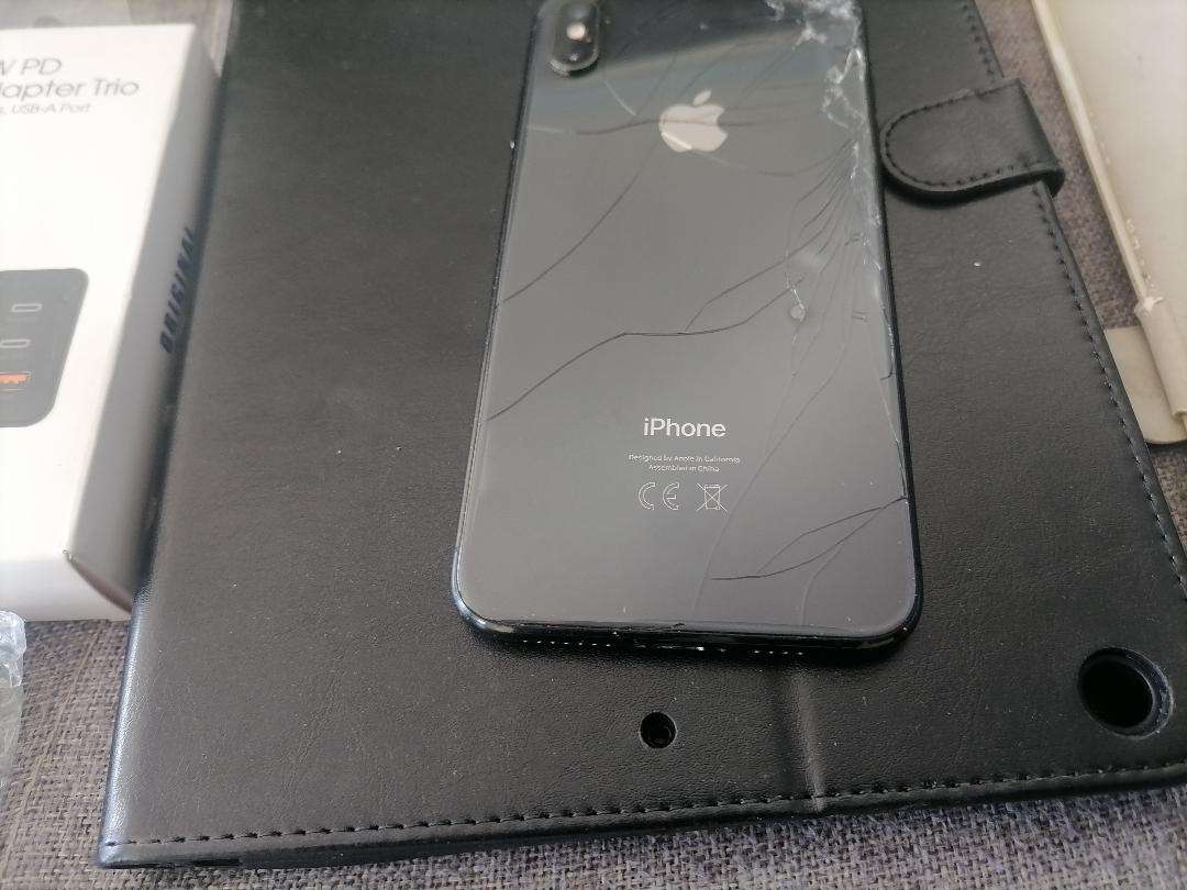 LOT OF APPLE PHONE, TABLET,NEW PHONE COVERS , ETC, ONE BID FOR THE LOT*