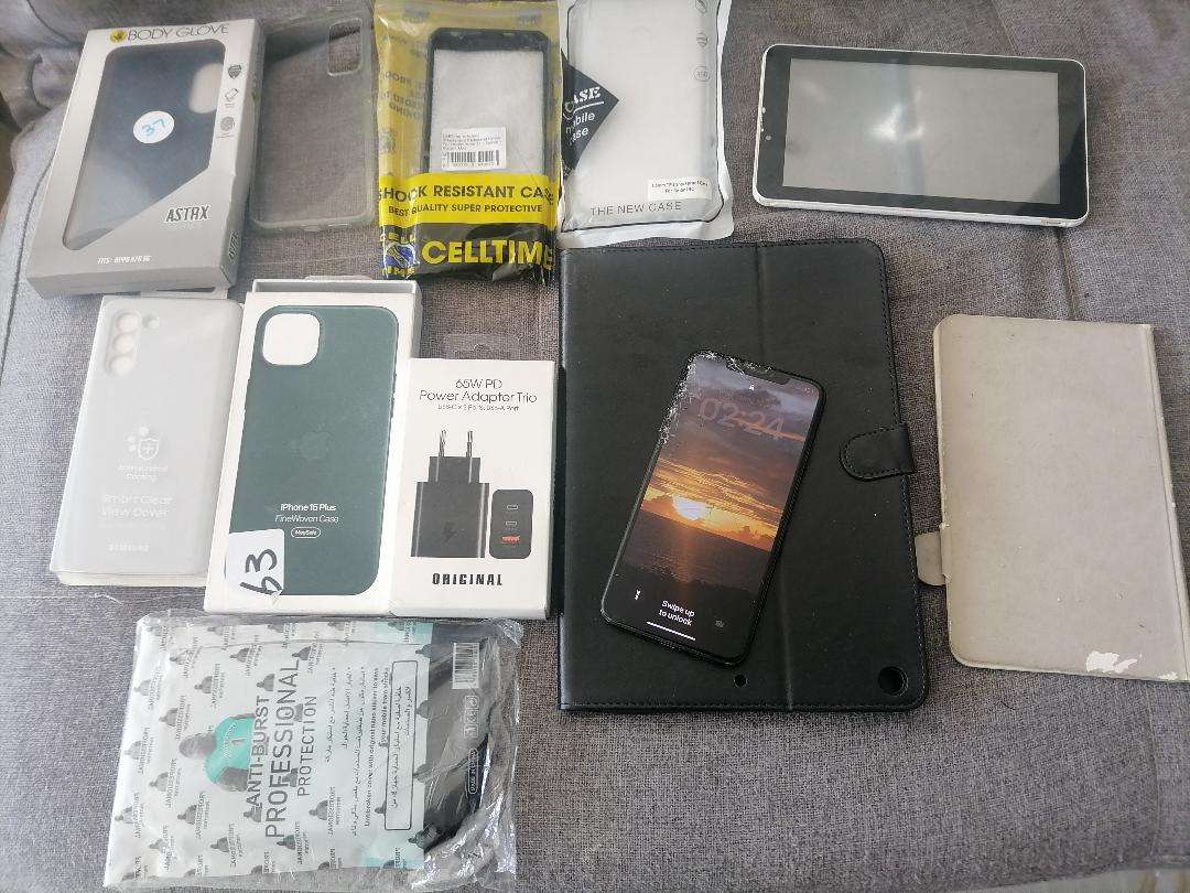 LOT OF APPLE PHONE, TABLET,NEW PHONE COVERS , ETC, ONE BID FOR THE LOT*