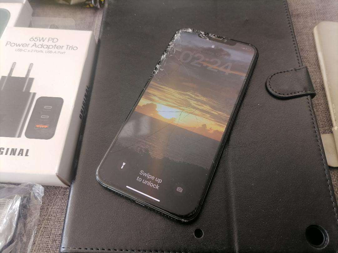 LOT OF APPLE PHONE, TABLET,NEW PHONE COVERS , ETC, ONE BID FOR THE LOT*