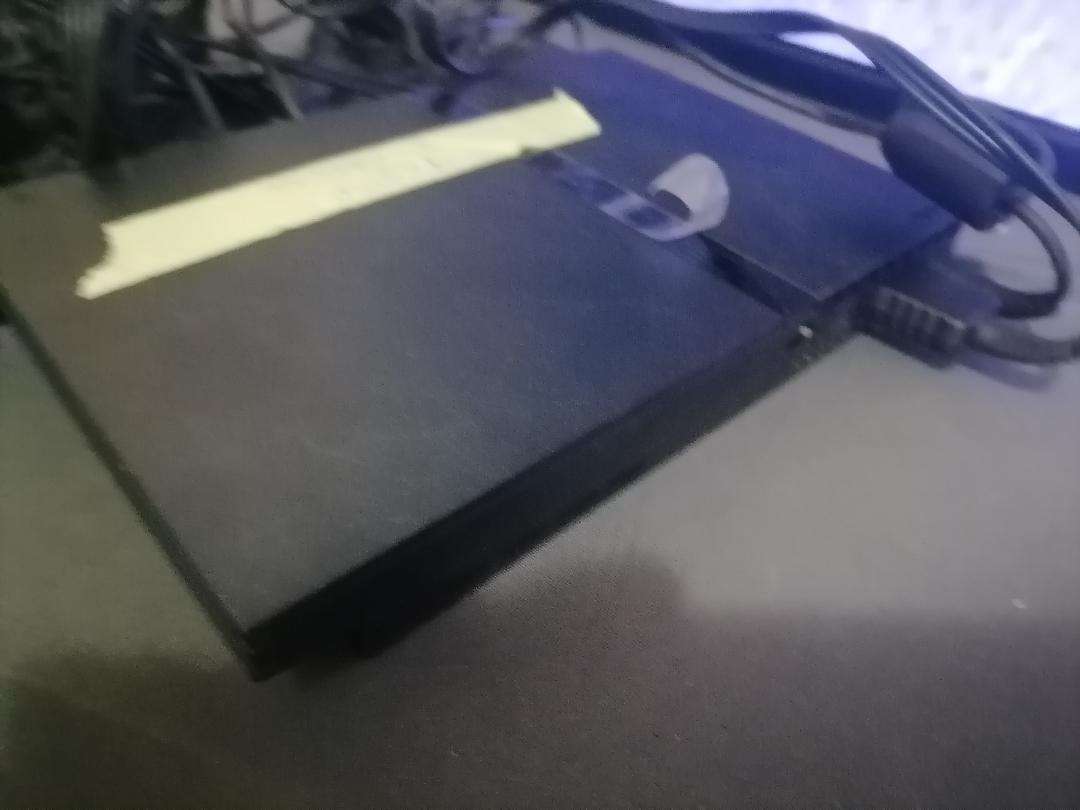 SONY PLAYSTATION WITH CONTROLLER AND CABLES