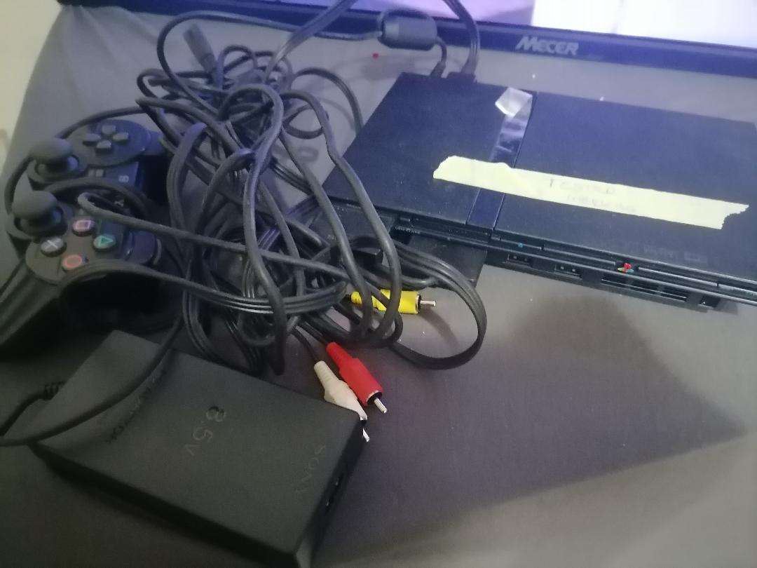 SONY PLAYSTATION WITH CONTROLLER AND CABLES