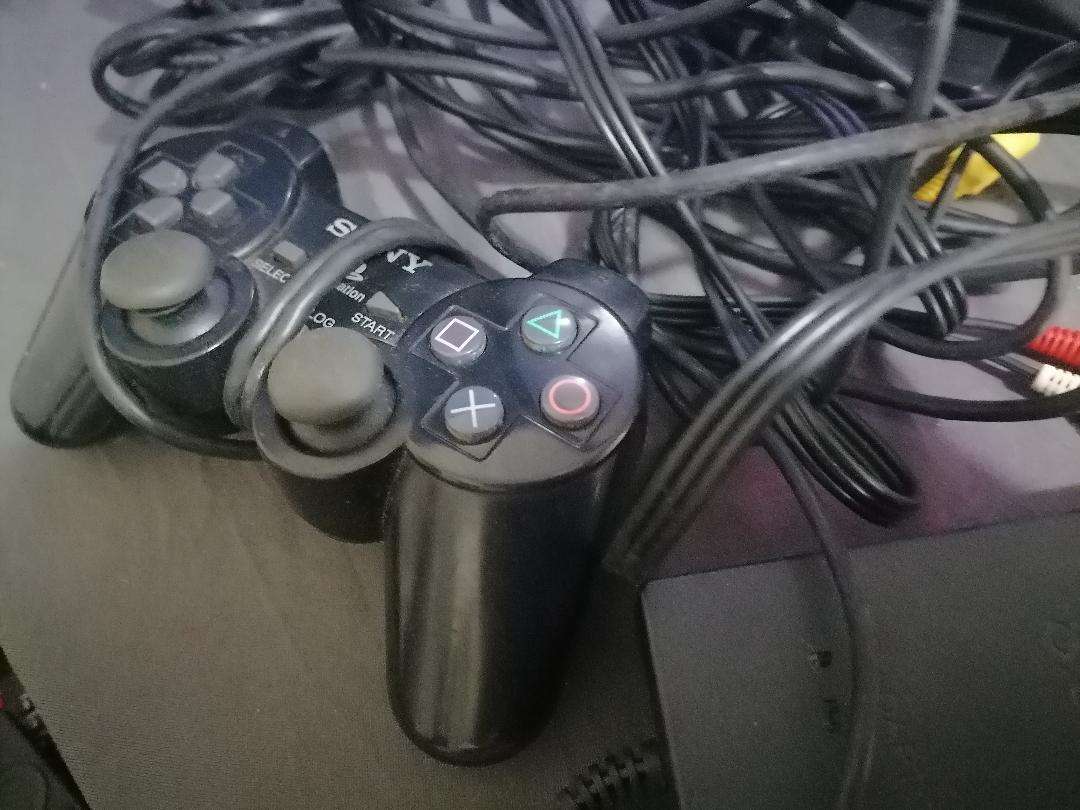 SONY PLAYSTATION WITH CONTROLLER AND CABLES