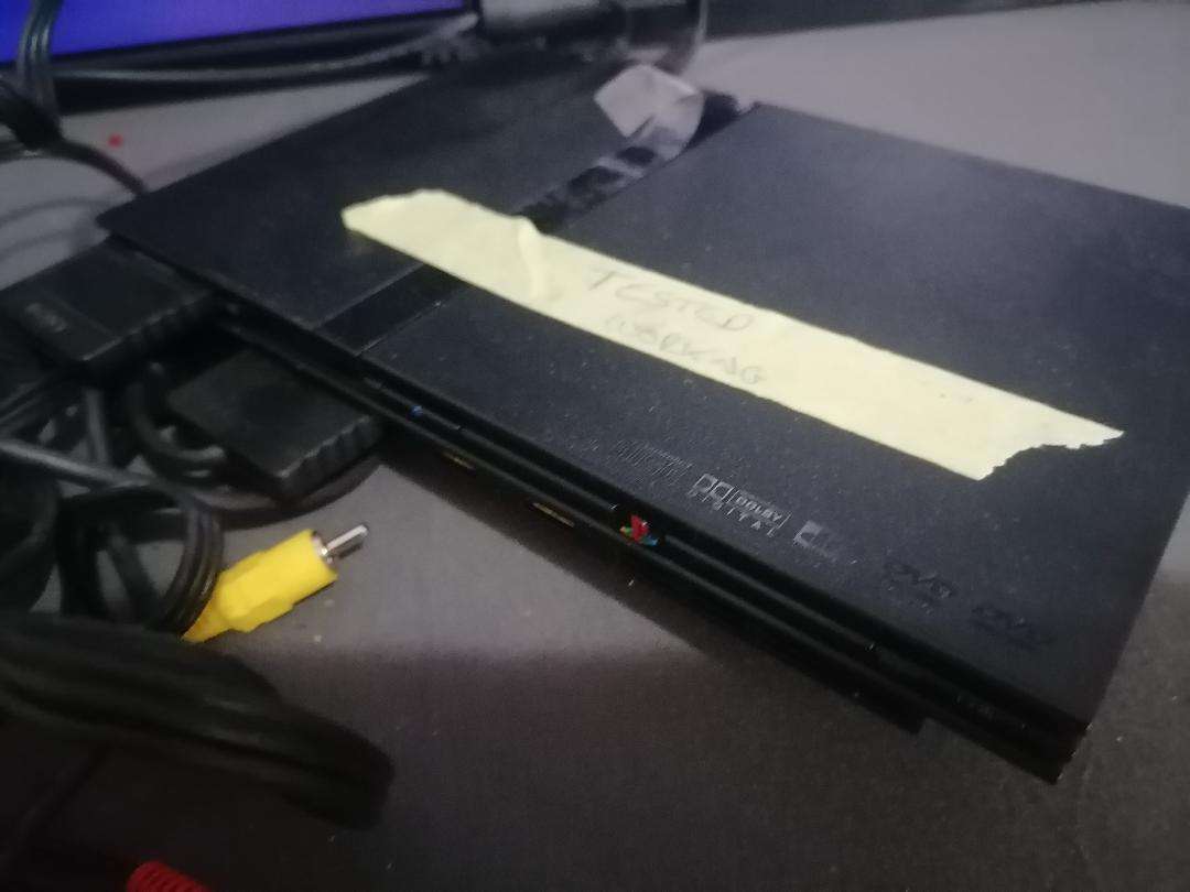 SONY PLAYSTATION WITH CONTROLLER AND CABLES