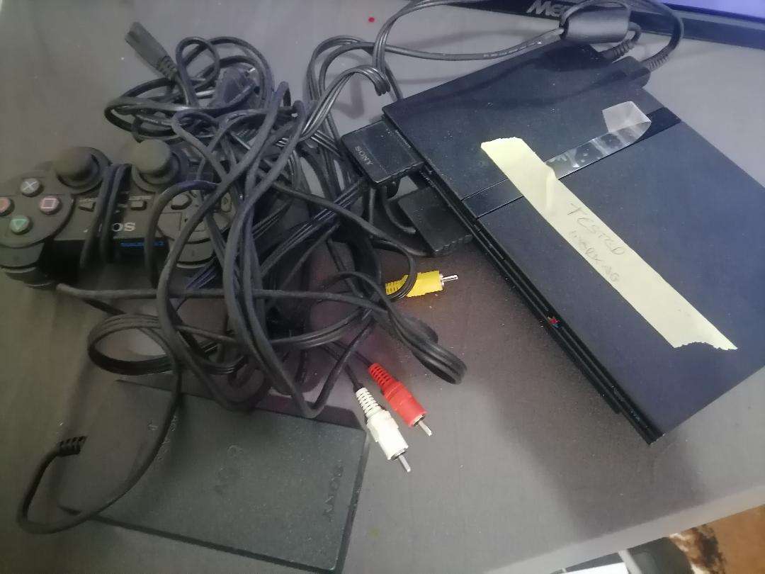 SONY PLAYSTATION WITH CONTROLLER AND CABLES