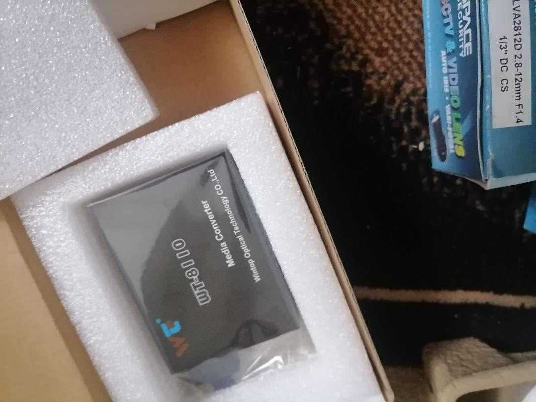 WIFI ROUTERS,CCTC CAMERA LENSES,FIBRE BOX ETC*ONE BID FOR LOT