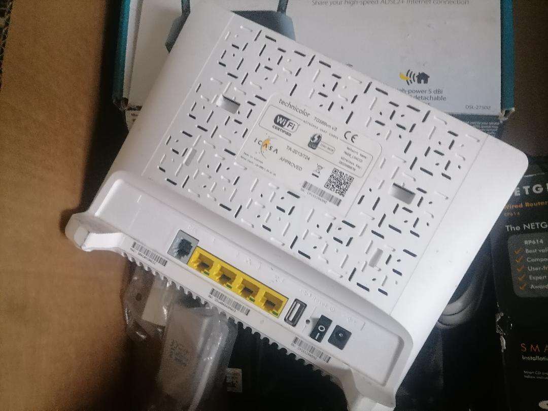 **LOT OF ROUTERS ETC*ONE BID FOR LOT AS PER PICS**