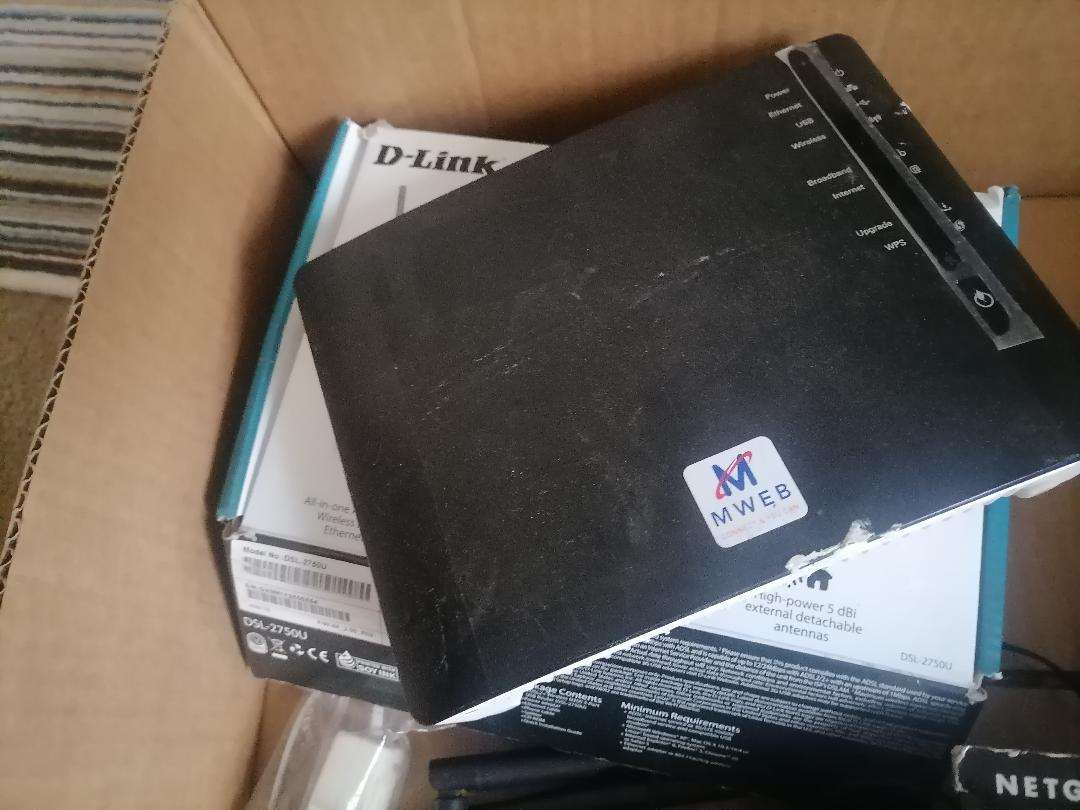 **LOT OF ROUTERS ETC*ONE BID FOR LOT AS PER PICS**