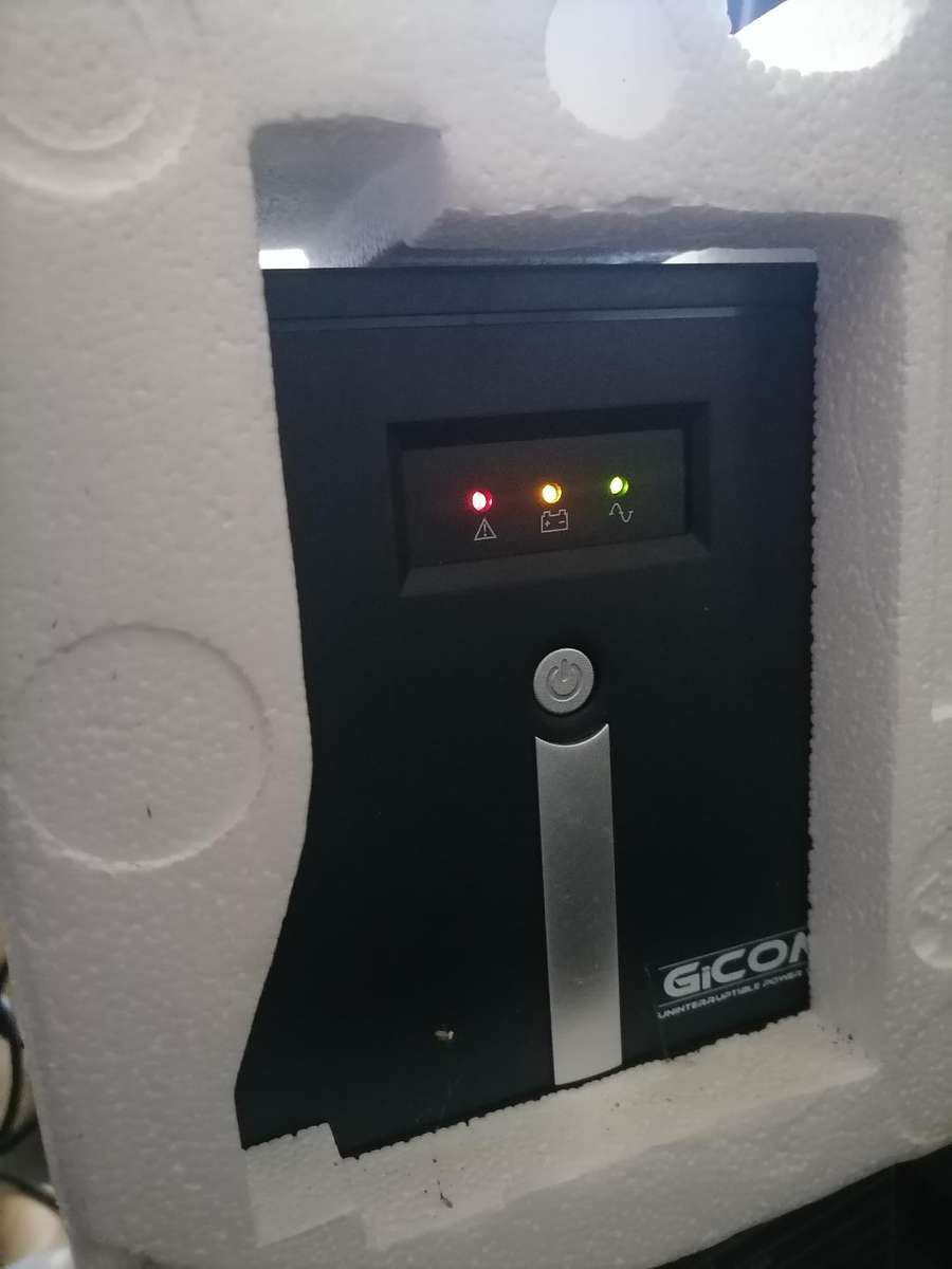 NEW GI-COM 1200VA UPS IN BOX WITH POWER CABLE*BOX DAMAGE*