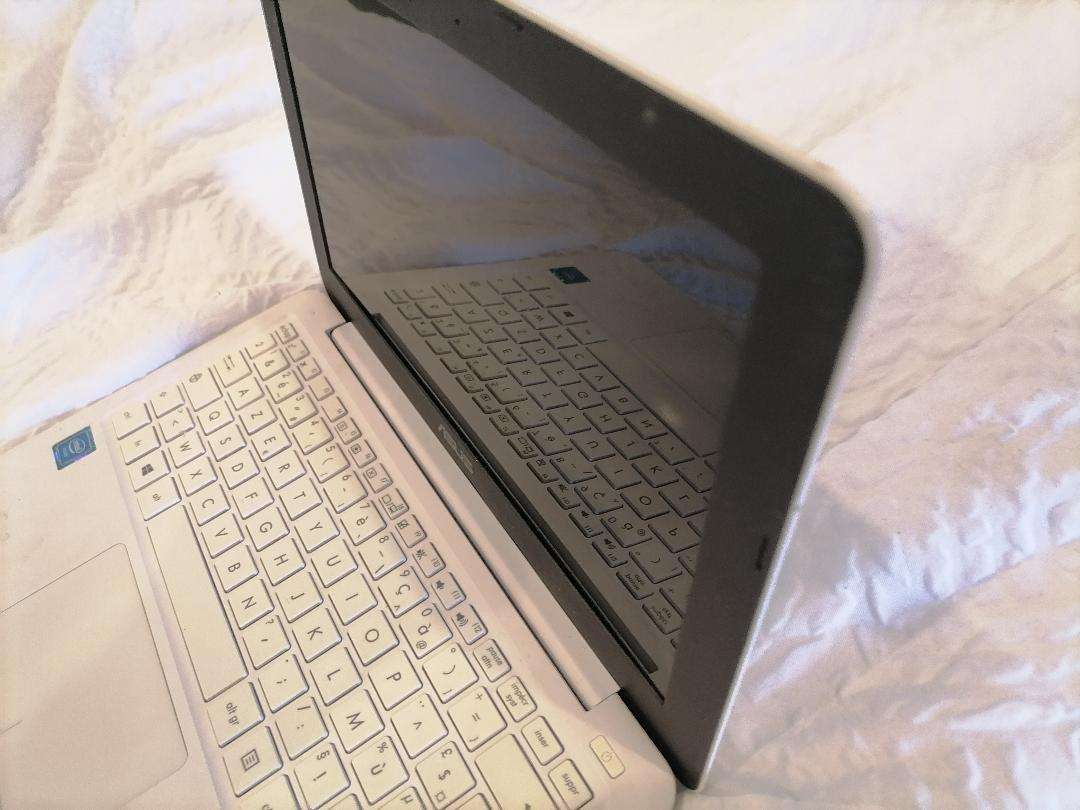 Asus E202S Laptop, No Charger, Not Tested, Sold As Is