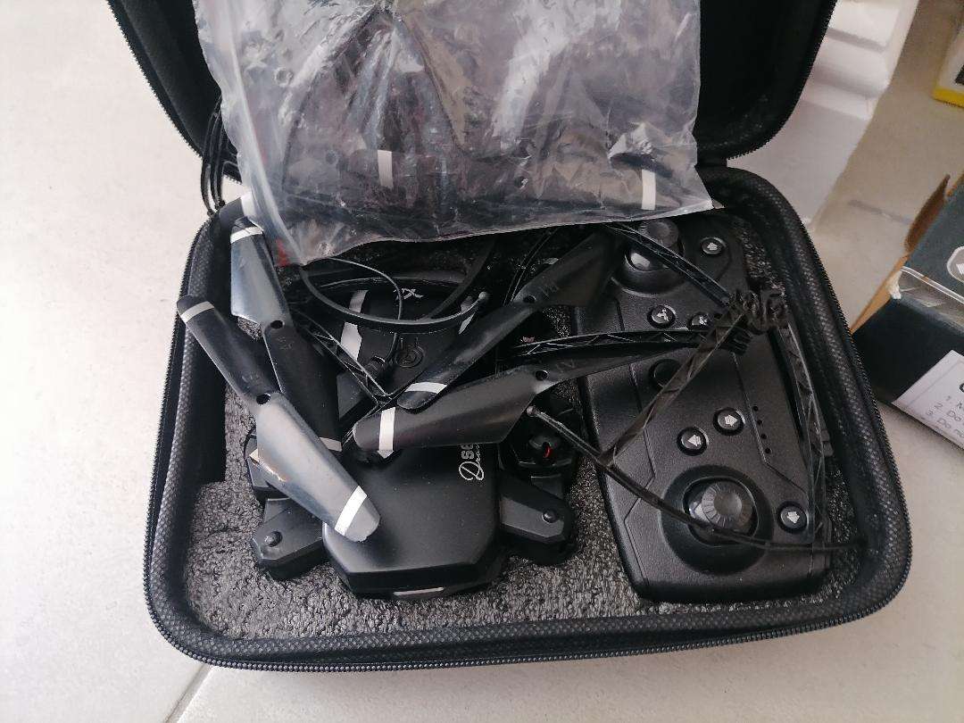 YEAR END CLEARANCE*ONE BID FOR LOT*DRONE, CONTROLLER IN CARRY CASE,REMOTE HELICOPTER ETC*UNTESTED*