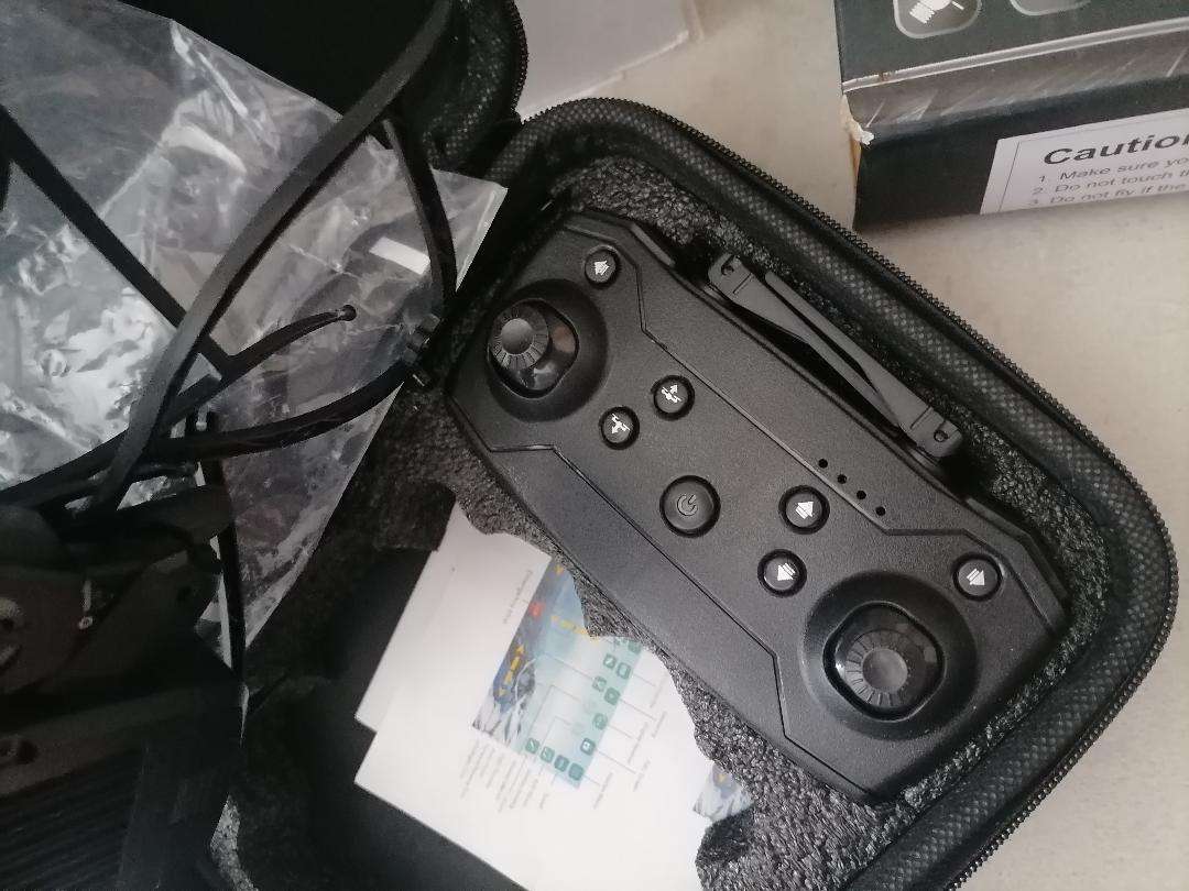 YEAR END CLEARANCE*ONE BID FOR LOT*DRONE, CONTROLLER IN CARRY CASE,REMOTE HELICOPTER ETC*UNTESTED*