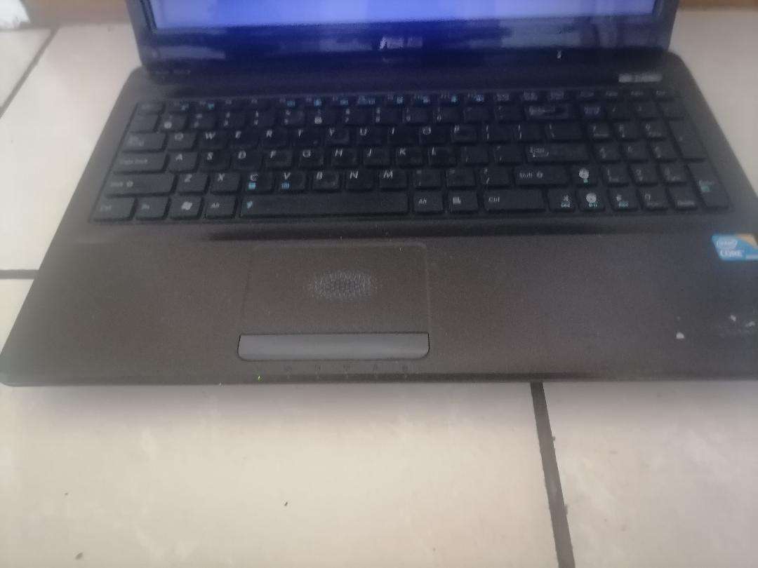 YEAR END CLEARANCE SALE*ASUS K52F I3 LAPTOP*4GB RAM, 1TB HDD*POWERS ON AND OFF*SOLD AS IS*